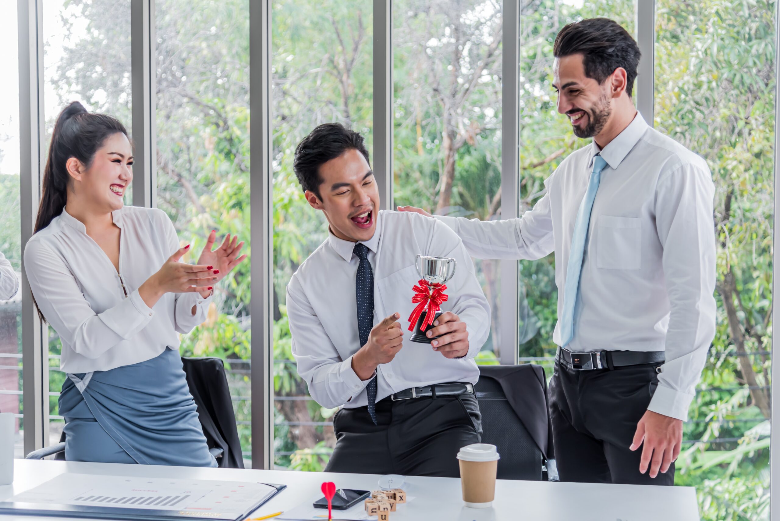 Client celebrating successful grant approval with help from Malaysia’s best financial advisors